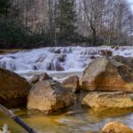stained rocks in Muddy Creek